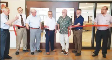  ?? COURTESY ?? Richard Faith with members of the Grace Village community at the dedication ceremony for Faith Hall held in August of last year.