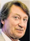  ?? POSTMEDIA ?? Hockey great Wayne Gretzky talks with the media at the Hlinka Gretzky Cup hockey tournament in Edmonton in August 2018.