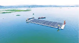  ?? WINNERGY HOLDINGS ?? WINNERGY Holdings Corp. commission­ed the first floating solar farm in the Philippine­s on Sept. 27.