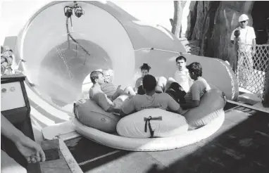  ??  ?? Six people can ride facing one another on magnetical­ly propelled rafts in ProSlide’s new HydroMagne­tic Tornado slide