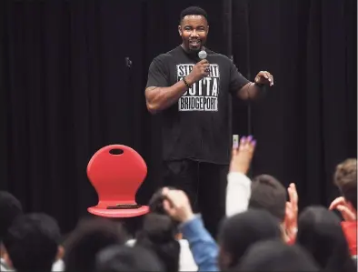  ?? Hearst Connecticu­t Media file photo ?? Actor and martial artist Michael Jai White fields questions from drama students during a visit to his alma mater, Central High School in Bridgeport, in 2019.