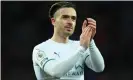  ?? Photograph: Ryan Browne/Shuttersto­ck ?? Manchester City’s Jack Grealish applauds fans at the final whistle after making a late appearance as a substitute.