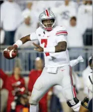  ?? CHRIS KNIGHT — THE ASSOCIATED PRESS FILE ?? Ohio State quarterbac­k Dwayne Haskins Jr. (7) throws a pass against Penn State during the second half of a game in State College earlier this season.