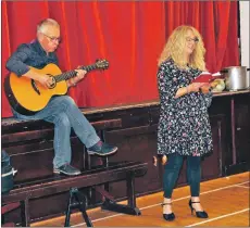  ??  ?? Nikki and Andy Surridge perform for the audience.