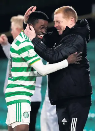  ??  ?? Big match: Neil Lennon with Ismaila Soro. Lennon will be under pressure yet again if Celtic do not win today