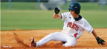  ?? STAFF PHOTOS BY C. B. SCHMELTER ?? South Pittsburg’s Hunter Powers steals second base against Trinity Christian during a TSSAA Class A state tournament game Tuesday at Middle Tennessee Christian School’s Joe Baron Field in Murfreesbo­ro.