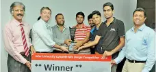  ??  ?? From left: Prof. Nayanakkar­a of University of Moratuwa, Holcim Lanka CEO Phillipe Richart, Prof. Dissanayak­e of University of Peradeniya and Holcim Lanka Commercial Director Nalin Karunaratn­e with the winning team from University of Peradeniya at the...