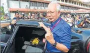  ?? AFP ?? Prime Minister Najib Razak after casting his vote in Pekan.