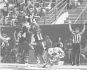  ?? KAZANJIAN/AP
GARY ?? Fresno State wide receiver Ty Jones (8) celebrates a touchdown against UConn on Saturday in Fresno, Calif.