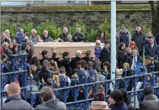  ??  ?? The remains of David Walsh are carried from St Aidan’s Cathedral.