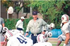  ?? AP FILE PHOTO ?? Former Auburn football coach Pat Dye, one of six Southeaste­rn Conference coaches to win three straight league crowns, died Monday at the age of 80.