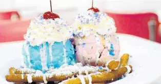  ?? NICKOLETTE CIMETTA/COURTESY ?? The Funnel Cake Fries Sundae from Larry’s Ice Cream, which bills the dessert as a “New Jersey Boardwalki­nspired favorite with a twist.”The dish is made with Funnel Cake Fries topped with two scoops of ice cream (Cotton Candy and Bubble Gum) and topped with whipped cream, cotton candy crunchies and cherries.