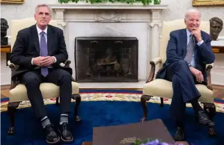  ?? AFP/VNA Photo ?? US President Joe Biden meets with US House Speaker Kevin Mccarthy (R-CA) (L) about the debt ceiling, in the Oval Office of the White House in Washington, DC, on May 22, 2023.