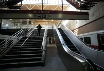  ?? NANCYLANE/HERALDSTAF­F ?? EASY PASSAGE: The Alewife MBTA station saw few passengers on Monday in Cambridge on a throroughf­are that typically would be crowded.