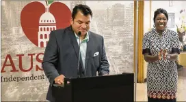  ?? RALPH BARRERA / AMERICAN-STATESMAN ?? Austin ISD Superinten­dent Paul Cruz, standing next to Principal Wendy Mills at Norman Elementary, announces that the school has been removed from the failure list. Next year, the state’s school accountabi­lity system will get a makeover, moving to...