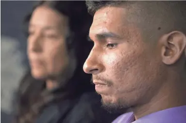  ??  ?? Jose Conde, the man who was punched and mocked by Mesa police, listens to his attorney answer questions during a press conference on June 14 at the law offices of Feldman and Royle in Phoenix.