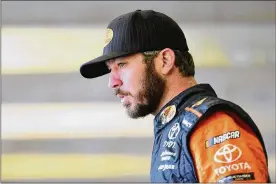  ?? JARED C. TILTON / GETTY IMAGES ?? Martin Truex Jr. and his crew chief will move to Joe Gibbs Racing next season with the demise of Furniture Row Racing.