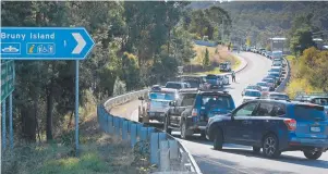  ?? Picture: PATRICK GEE ?? HOLD IT: Lines for the Bruny Island Ferry yesterday.