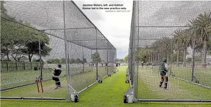  ?? WARWICK SMITH/STUFF ?? Jasmine Waters, left, and Ashtuti Kumar bat in the new practice nets.