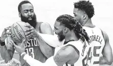  ?? Elizabeth Conley / Staff photograph­er ?? All-Star guard James Harden didn’t play when the Rockets ended Utah’s nine-game winning streak last month.