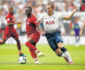  ?? Picture: JULIAN FINNEY/GETTY IMAGES ?? SPUR OF THE MOMENT: Naby Keita of Liverpool, left, is challenged by Harry Kane of Tottenham Hotspur during their Premier League match between the sides at Wembley Stadium, in London, on Saturday