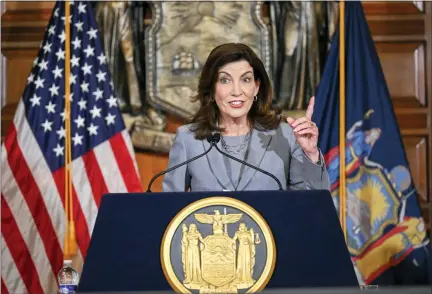  ?? HANS PENNINK-ASSOCIATED PRESS FILE ?? New York Gov. Kathy Hochul speaks to reporters about legislatio­n passed during a special legislativ­e session in the Red Room at the state Capitol, July 1 in Albany, N.Y.