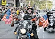  ?? GO NAKAMURA/FOR THE NEW YORK DAILY NEWS ?? Fans of all ages flocked to Wednesday’s parade and celebratio­n in New York. Many used the occasion to express their support for equal pay, a leading issue for the U.S. women’s team.