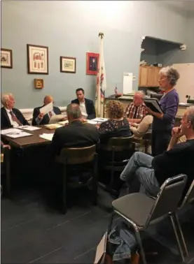  ?? MAUREEN WERTHER — FOR THE SARATOGIAN ?? Resident Liz Kormos, standing, makes public comments to the Ballston Spa Village Board of Trustees on Monday regarding the ongoing dispute between the village and the city regarding the proposed Geyser Road bike and walking trail.