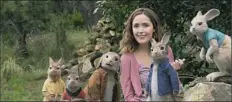  ?? Sony Pictures ?? Mopsy (Elizabeth Debicki), Flopsy (Margot Robbie), Benjamin (Colin Moody), Bea (Rose Byrne), Peter Rabbit (James Corden) and Cotton-Tail (Daisy Ridley) in “Peter Rabbit.”