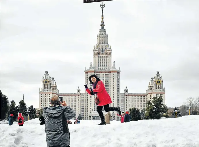  ??  ?? A tourist poses for pictures on a snow pile in front of the main building of the state university in this famous Russian city. The building — one of seven skyscraper­s that Josef Stalin ordered built around the city by gulag labour — was until 1997 the tallest building in Europe. To stand a chance of winning R500, tell us the name of the city where the university may be found.Send your answer to travelquiz@sundaytime­s.co.za. Entries close at noon on Tuesday March 4. Last week’s winner was Don Keene of Betty’s Bay.The correct answer was Yosemite National Park.