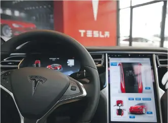  ?? SPENCER PLATT/GETTY IMAGES ?? The U.S. safety board in September found that design limitation­s of the Tesla Model S Autopilot played a major role in a May 2016 fatal crash in Florida. A similar model crashed Monday.