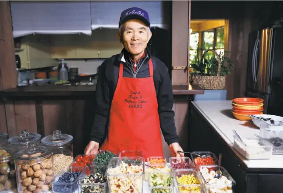  ?? Photos by Sarah Rice / Special to The Chronicle ?? Tong Kim makes breakfast for guests at the Carmel Resort &amp; Wellness Center, formerly the Carmel Valley Lodge, which no longer serves waffles, milk or juice.