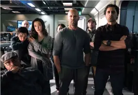  ??  ?? Statham with Page Kennedy, Ruby Rose, Li Bingbing and Cliff Curtis in The Meg