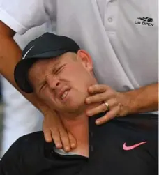 ?? TIMOTHY A. CLARY/AFP/GETTY IMAGES ?? Kyle Edmund needed work on his shoulder, neck and back in Friday’s third-round match at the U.S. Open. In the end, it wasn’t enough.