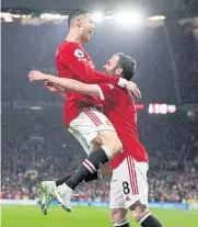  ?? REUTERS ?? Manchester United’s Cristiano
Ronaldo, left, and Juan Mata celebrate during the match against Brentford.
