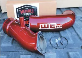  ??  ?? Wehrli Fabricatio­ns new 4” Resonator Pipe and 3.5” Intake Horn offer increased airflow to the turbocharg­er for better performanc­e, enhanced turbocharg­er sound, and much better looks under the hood.