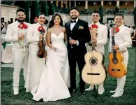  ?? (Max Junio via The New York Times) ?? Kristina Trejo and Anthony Salguero incorporat­ed a mariachi band performanc­e into their wedding on June 23. Mariachi, a soundtrack for celebratio­n in Mexico, offers a way for couples to honor their heritage at their weddings.