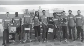  ??  ?? Fidelity Investment staff members pitched in to support a school supply drive collecting supplies for students in need who attend APS schools.