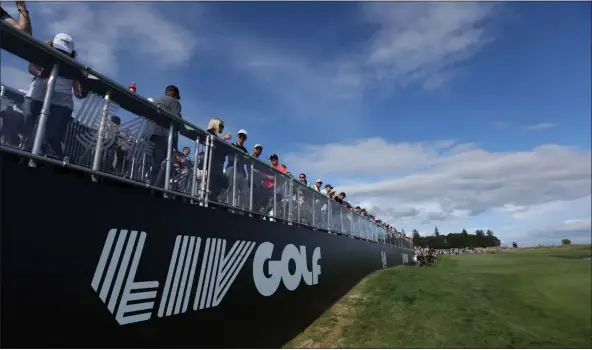  ?? STEVE DIPAOLA — THE ASSOCIATED PRESS ?? Fans await the final grouping at the 18th hole during the third round of the Portland Invitation­al LIV Golf tournament in North Plains, Ore., Saturday, July 2, 2022.