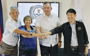  ?? COURTESY OF RUDY ESPERAS ?? PHILIPPINE Sports Commission chairman Richard “Dickie” Bachmann (third from left) and commission­ers (from left) Fritz Gaston, Olivia “Bong” Coo and Edward Hayco pose for unity.