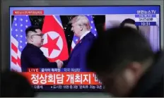  ?? Lee Jin-man/Associated Press ?? A TV screen shows file footage of President Donald Trump and North Korean leader Kim Jong Un during a news program Wednesday at the Seoul Railway Station in South Korea.