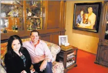  ?? K.M. Cannon ?? Las Vegas Review-journal @Kmcannonph­oto Jerry Lewis’ daughter, Danielle Lewis, and Sean Mcclenahan at the Lewis family’s home Thursday. The two-story home at 1701 Waldman Ave. in the Scotch 80s neighborho­od in downtown Las Vegas is for sale for $1.4...