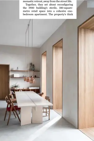  ??  ?? Dining area Mar and Ask made the table using wood left over from the renovation of the house. It is surrounded by a mix of chairs, including Hans J Wegner’s ‘Sawbuck’ for Carl Hansen &amp; Søn, one by Børge Mogensen for FDB Møbler and a ‘Folding Chair’ by Egon Eiermann. Overhead hang Alvar Aalto’s ‘Golden Bell’ lights by Artek Kitchen Bespoke plywood fronts and copperplat­e handles have been added to the Ikea cabinets. The island is made from poured concrete and the tap is a design by Vola Stockist details on p169 ➤