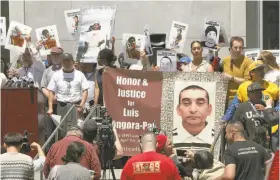  ??  ?? Mario Woods’ and Luis Góngora Pat’s families rally at the Hall of Justice to protest the S.F. district attorney’s decision not to charge the officers.