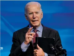  ?? The Associated Press ?? ■ In this Jan. 8 file photo, President-elect Joe Biden speaks during an event at The Queen Theater in Wilmington, Del.