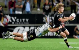  ?? GETTY IMAGES ?? Damian McKenzie in attack mode for the Chiefs against the Hurricanes in Hamilton last night.