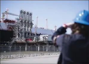  ?? (Bloomberg (WPNS)/Mark Felix) ?? An LNG Tanker vessel waits to be loaded at the Cheniere Sabine Pass Liquefacti­on facility in Cameron, La. in April.