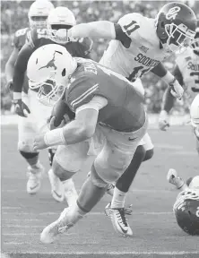  ?? Tom Reel / Staff photograph­er ?? Even though Sam Ehlinger had some success running the ball last season with a team-high 381 yards rushing, Texas would prefer for the sophomore to be more patient in the pocket.