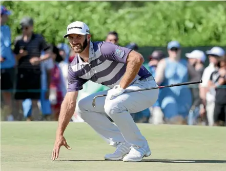  ??  ?? Dustin Johnson, of the United States, lines up a putt on the sixth green during the third round of the US Open at Shinnecock Hills Golf Club. GETTY IMAGES