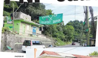  ?? PHOTOS BY CHRISTOPHE­R SERJU ?? The messages leave no doubt as to the favoured party in this section of Annotto Bay, St Mary, as Dr Shane Alexis of the People’s National Party goes up against Dr Norman Dunn, the Jamaica Labour Party’s candidate, for the St Mary South East...